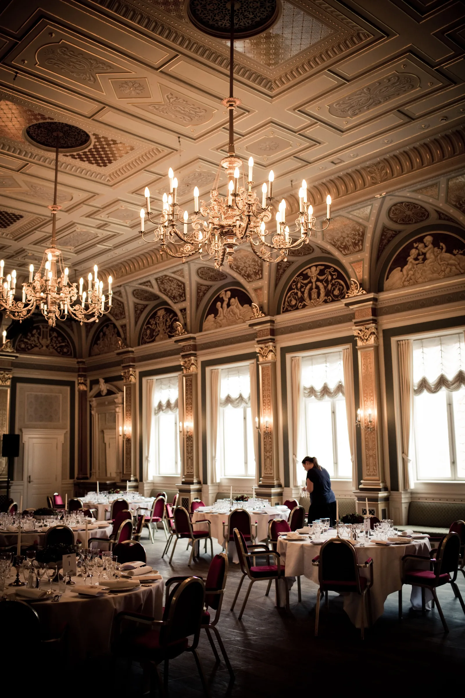 A classic dining room with chandeliers